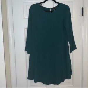 Long Sleeve Baby doll dress with open back slit